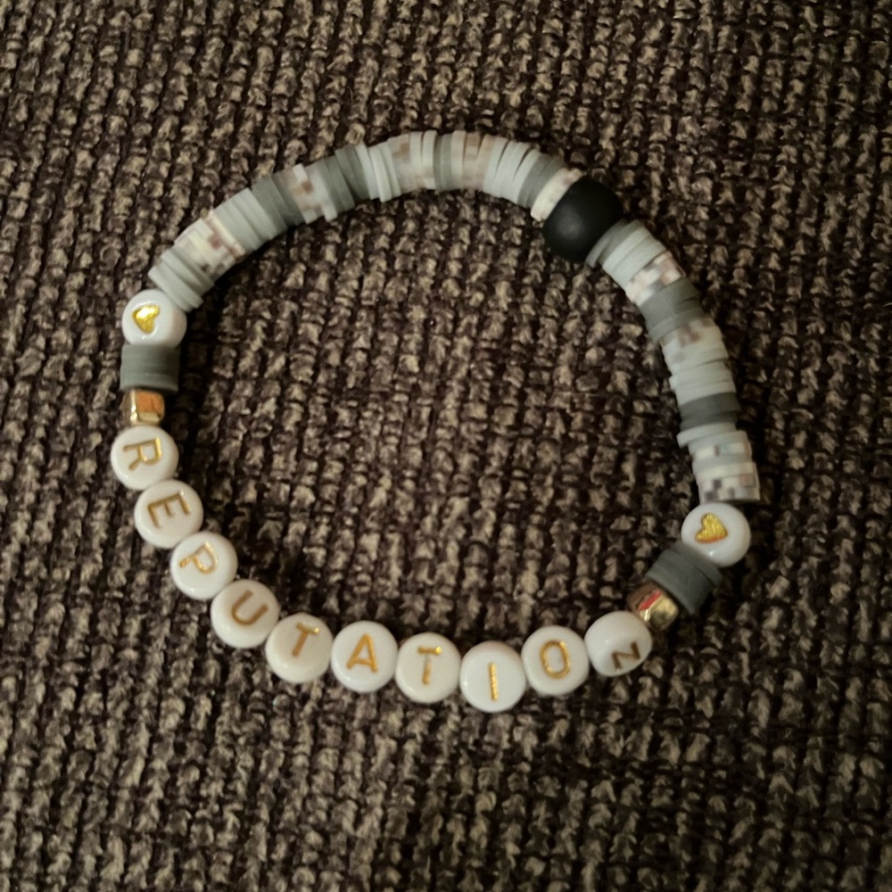 Taylor Swift "Reputation" bracelet.